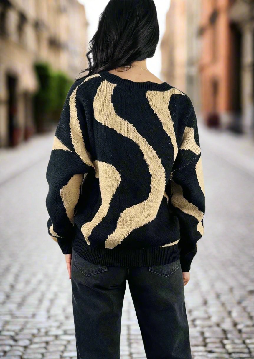 SWIRL KNIT SWEATER